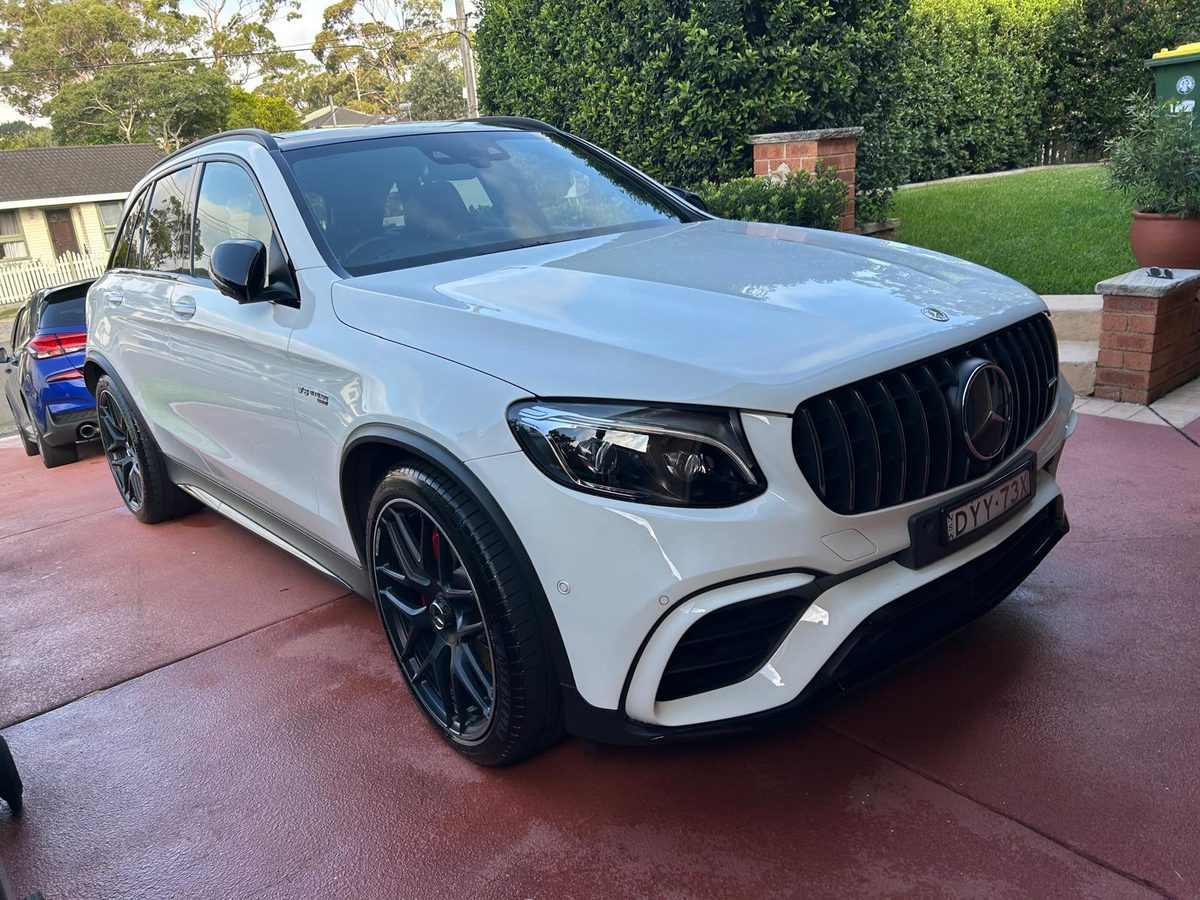 White Mercedes-AMG GLC detailed at home